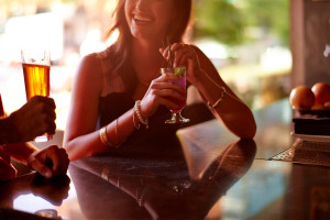 Lure + Till photo of woman with cocktail