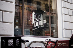 Coffee Cultures window Arriving Spring decal