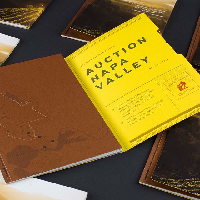 Auction Napa Valley, hosted by @napavintners, is an annual weekend of events that includes vineyard parties, vintner-hosted dinners, and live auctions to benefit disadvantaged families in the region. We designed a booklet invitation for #AuctionNapa that is custom die-cut, side sewn-bound, and incorporates French folds, multiple metallic inks, and de-bossed details.