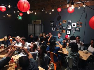 CDA staff toasting in a restaurant