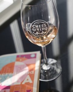 Chefsgiving branded wineglass and program