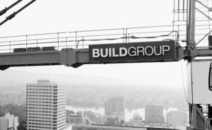 Build Group on a crane with Lake Merritt in the background