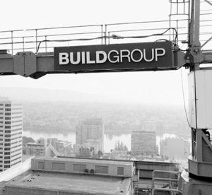 Build Group on a crane with Lake Merritt in the background