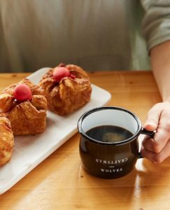 Crafstman and Wolves mug with pastries