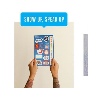 Show Up, Speak Up with hands holding Vote stickers