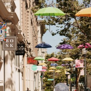 Colorful umbrellas suspended over a street