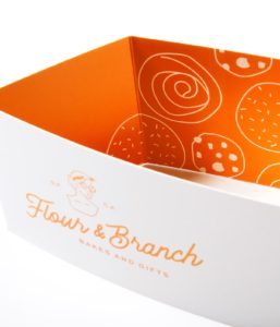 Flour & Branch branded box showing interior cookie illustrations