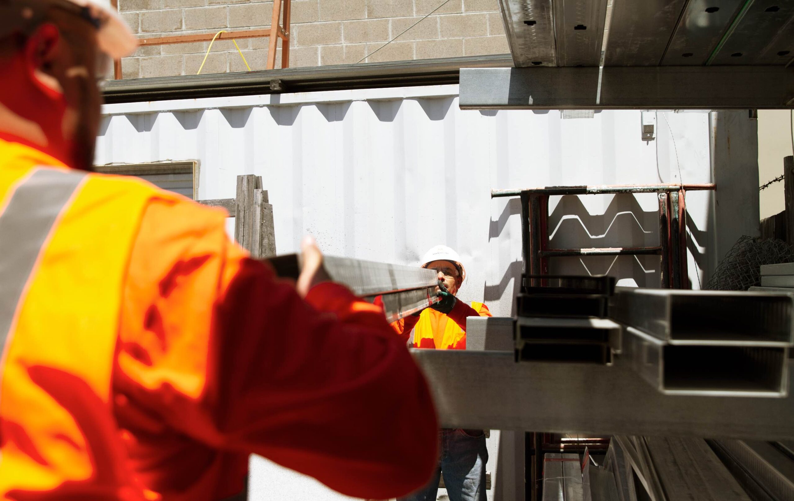 Construction workers loading materials