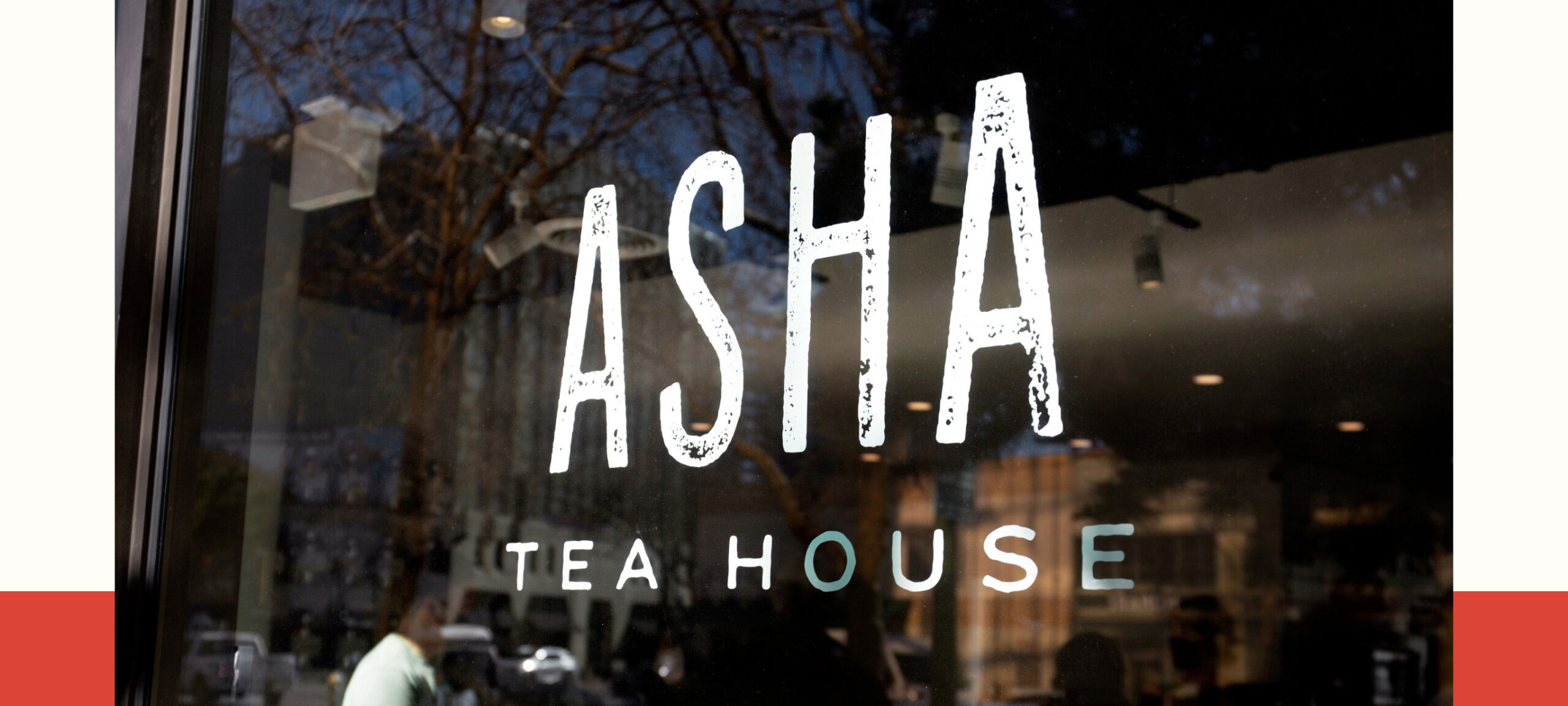 Window vinyls of Asha Tea House wordmark