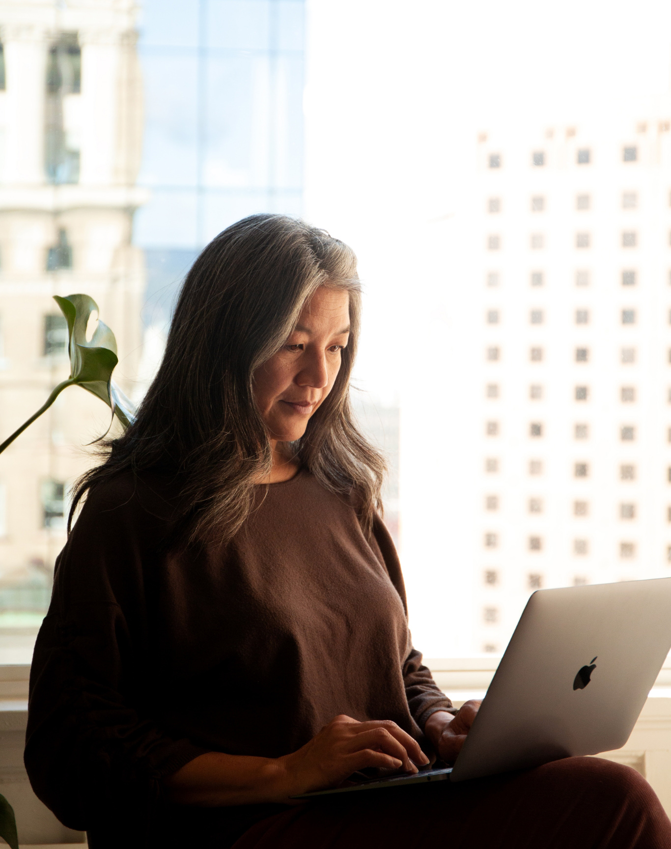 Photo of Kathryn working on laptop