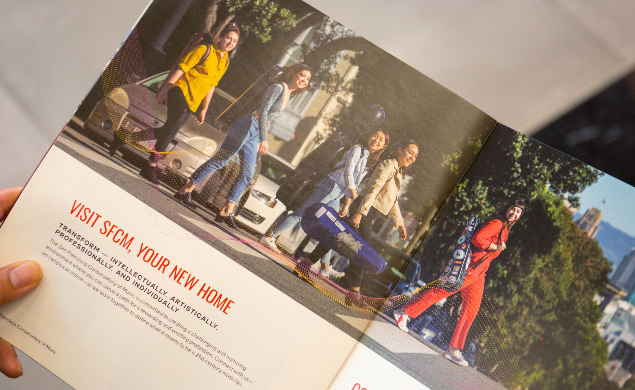 Music students crossing the street. Interior spread of San Francisco Conservatory of Music lookbook.