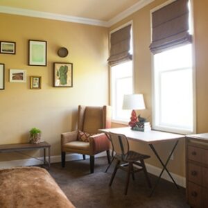Wydown Hotel sunlit room, desk and chairs